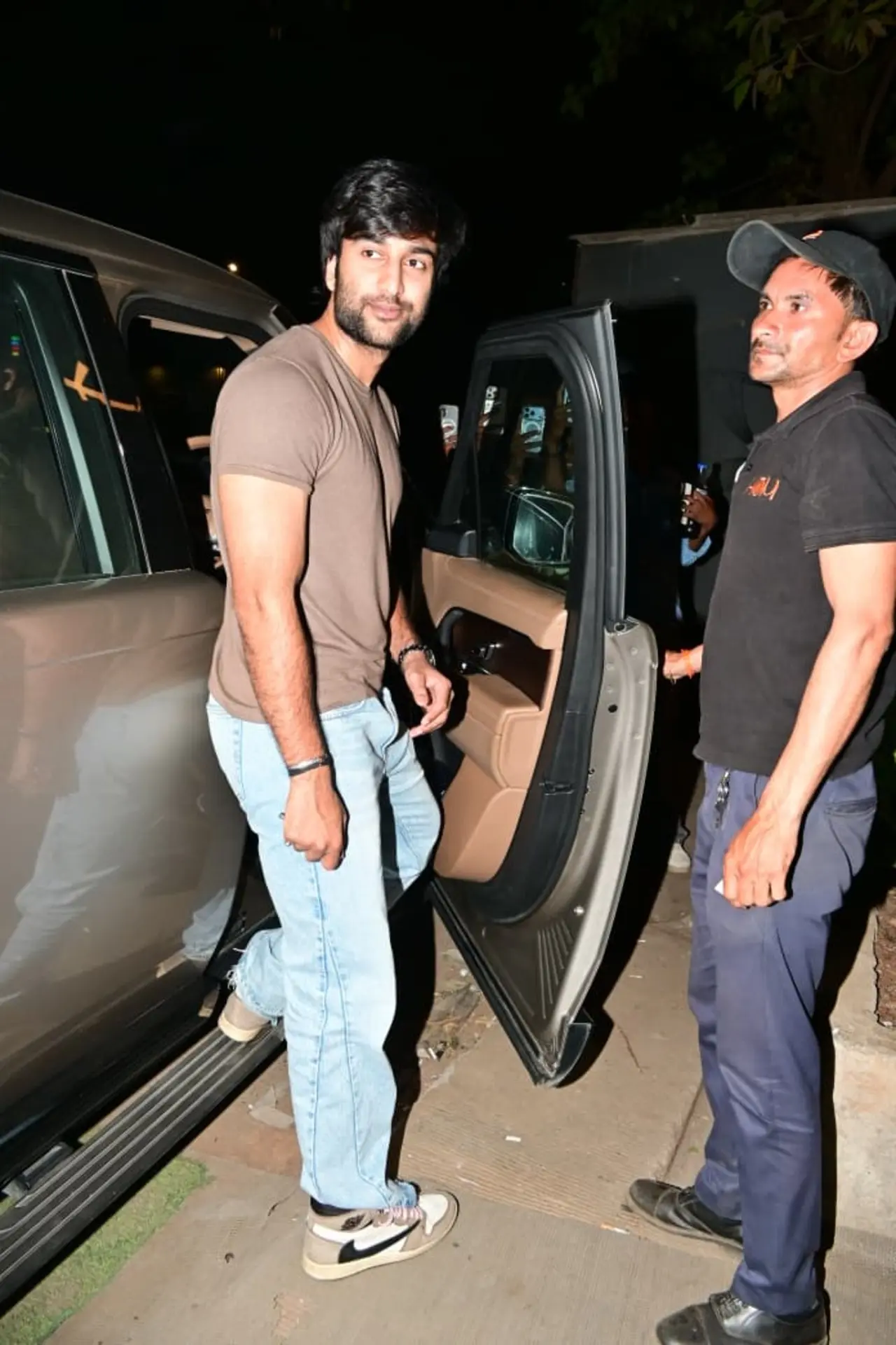 Meezaan Jafri was spotted exiting a party in a brown T-shirt paired with jeans. Keeping it simple yet stylish, he carried a relaxed vibe.